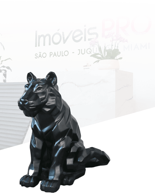A escultura original de pantera em frente à recepção da Imóveis PRO